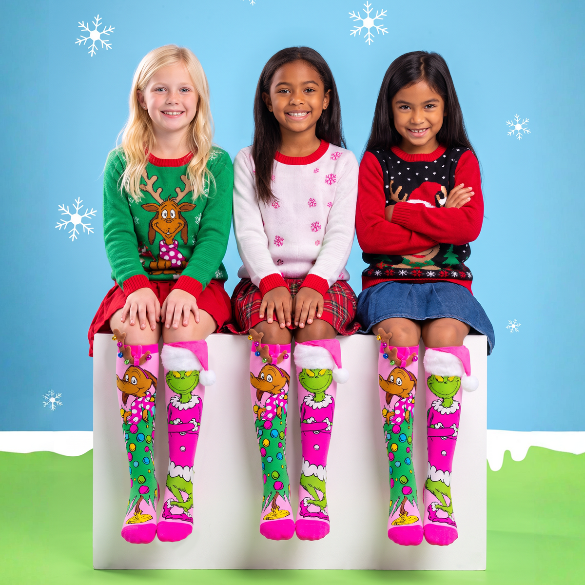 PRETTY IN GRINCH SOCKS
