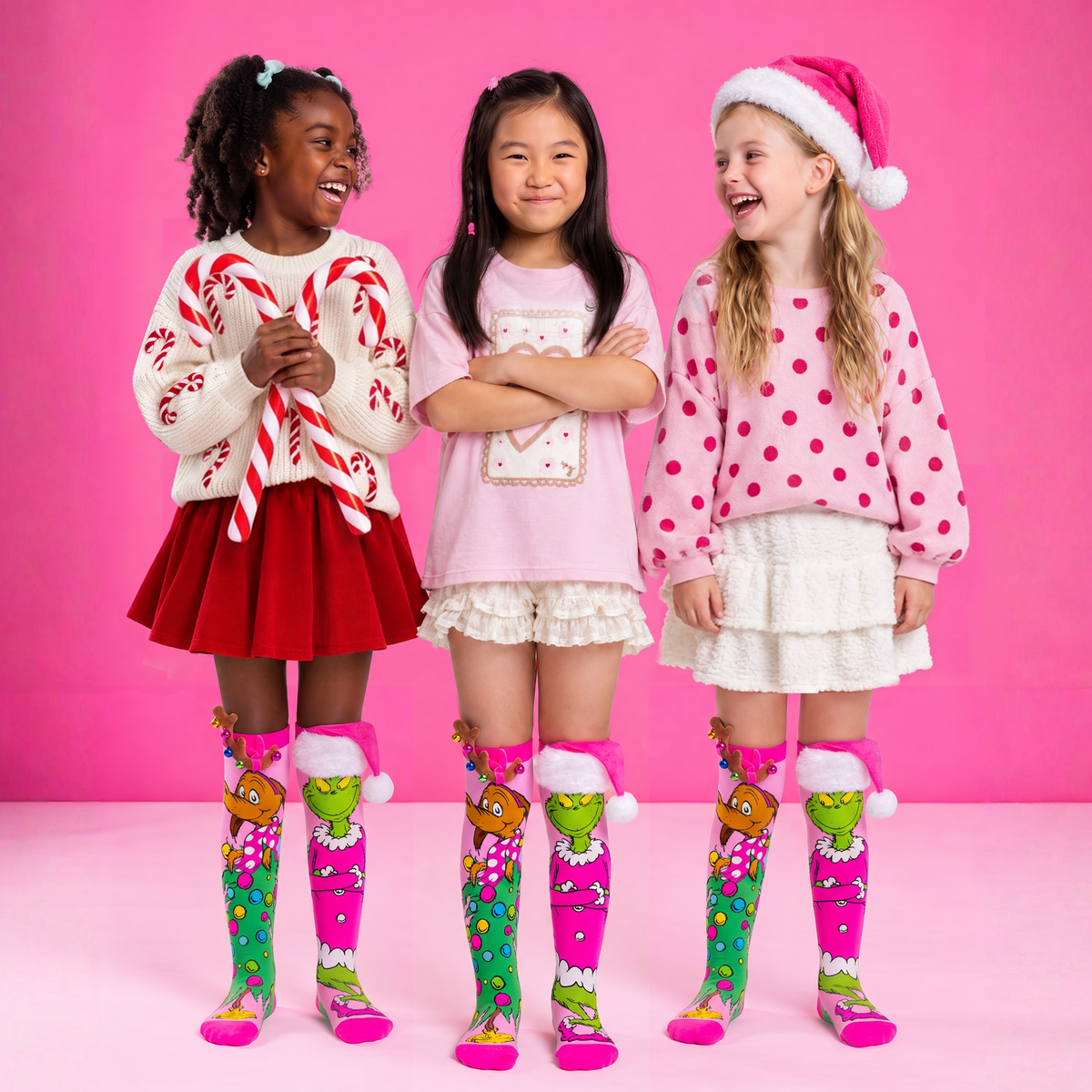PRETTY IN GRINCH SOCKS